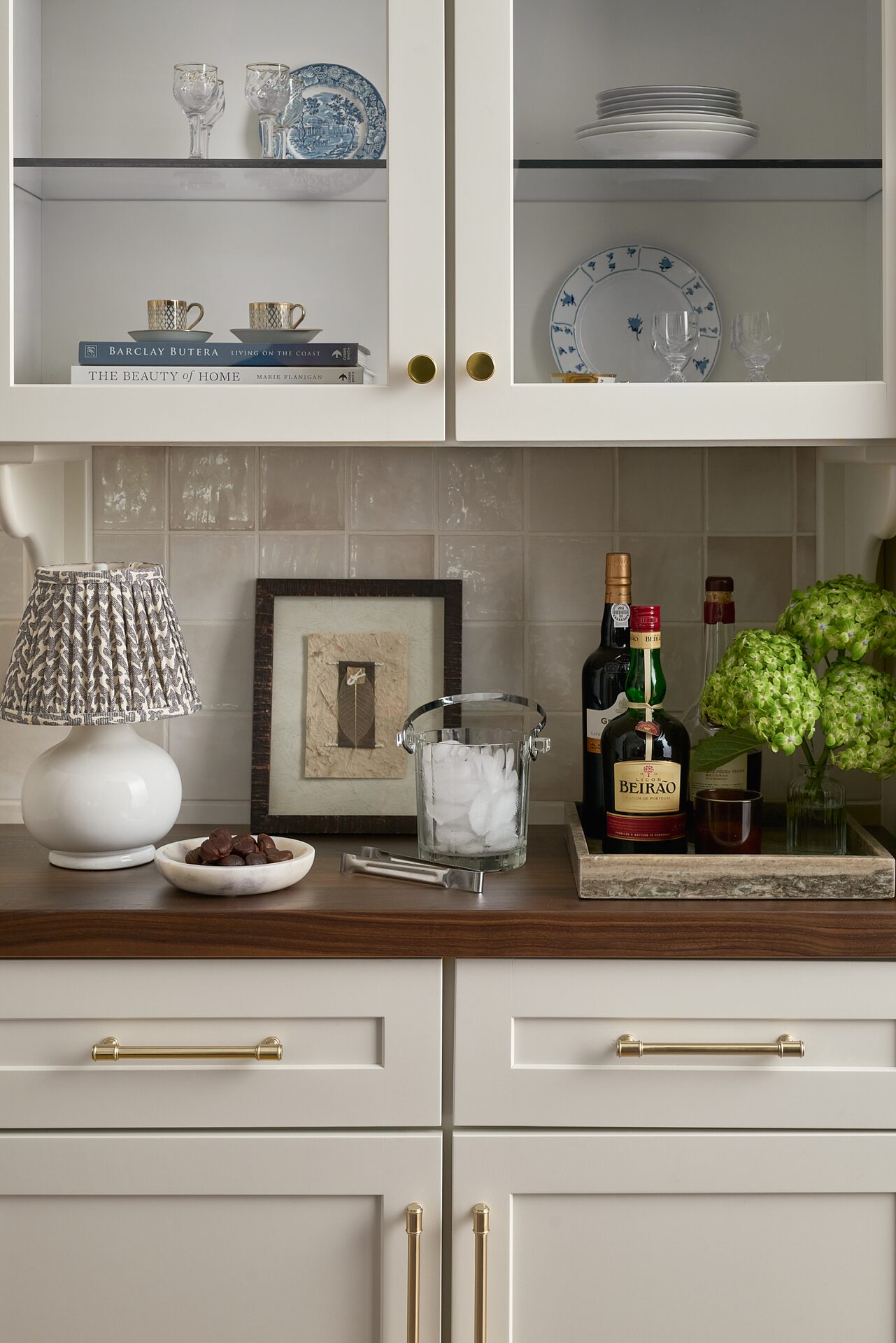 Kensington Kitchen bar seating with pendant lighting and marble countertop