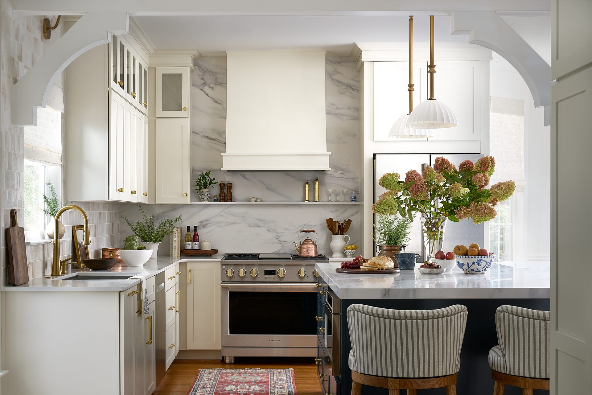 Kensington Kitchen full overview with two-tone cabinetry and quartzite island