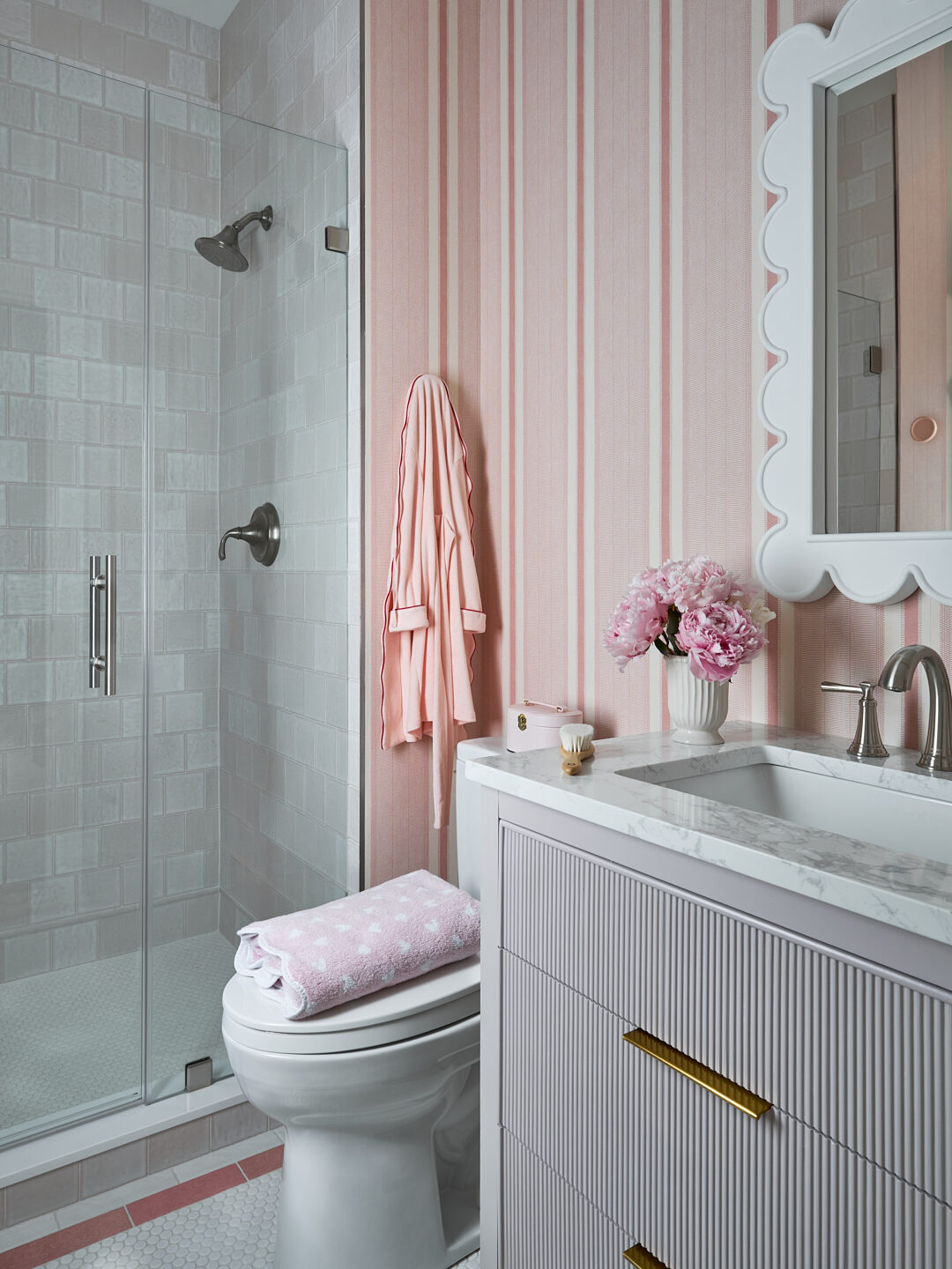 Millwood Road girl's bath shower with glass enclosure and fluted lilac vanity