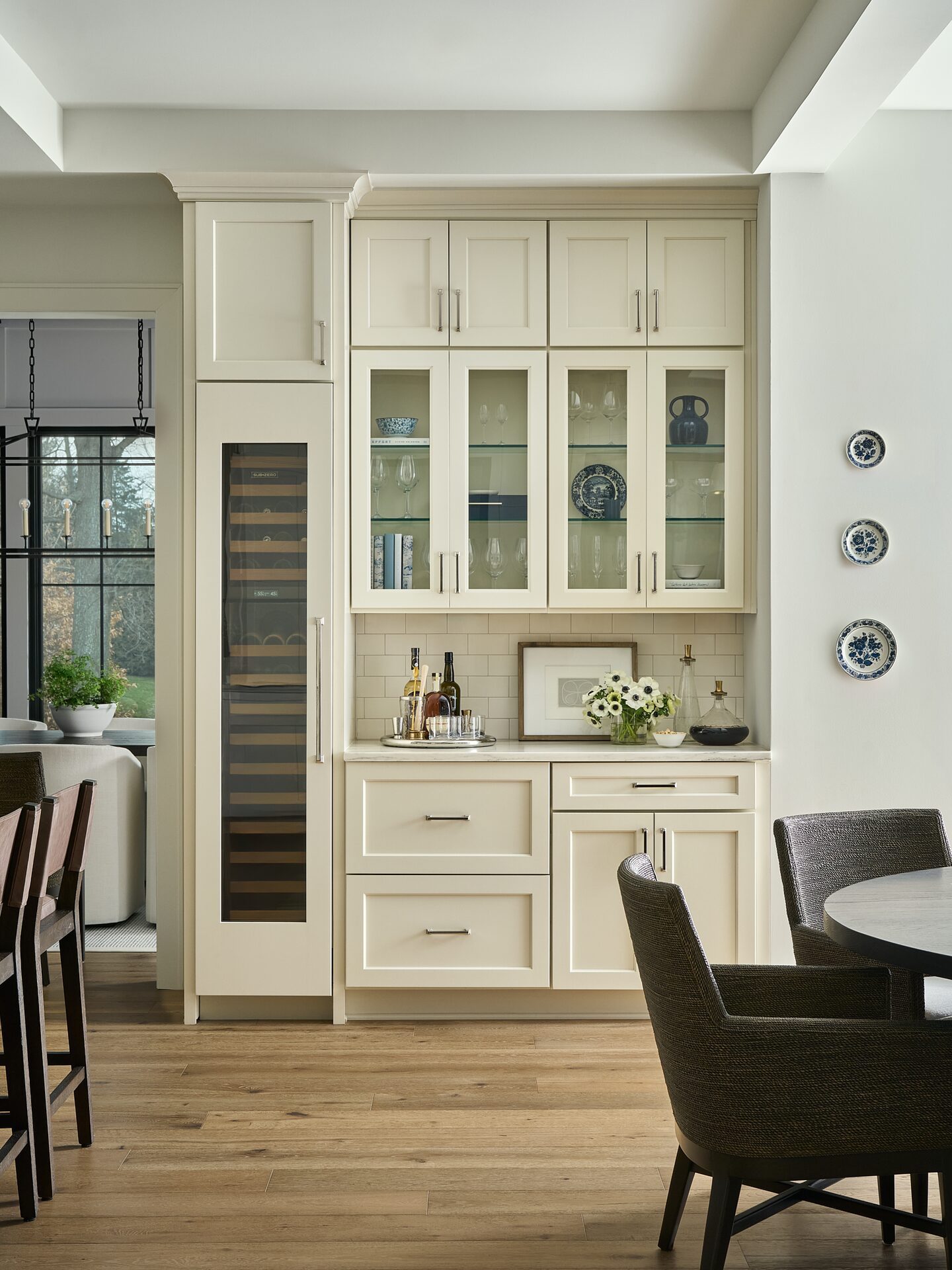 Worthington Road built-in bar with integrated lighting and dark cabinetry